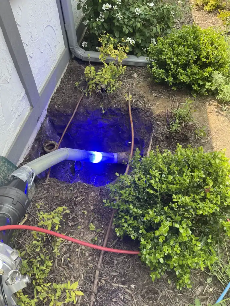 Trenchless plumbing technology featuring blue light technology, used by Long Island Sewer and Water Main for efficient, non-invasive pipe repair and replacement services in Long Island, NY. The blue light method allows for precise diagnostics and repairs