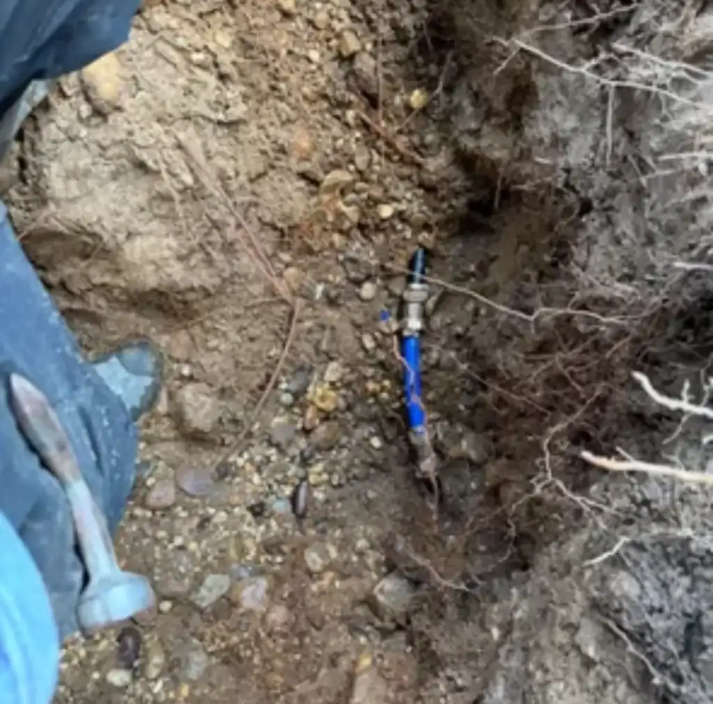 Trenchless plumbing installation featuring a blue pipe, representing the innovative, non-invasive method used by Long Island Sewer and Water Main for efficient water and sewer line replacements in Long Island, NY. The image showcases the modern, durable blue piping system designed to minimize disruption while ensuring high-performance plumbing solutions.